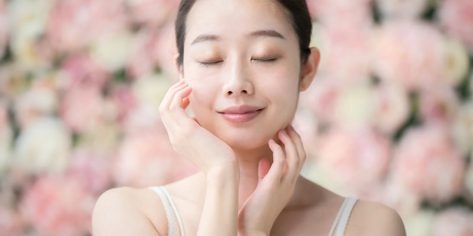 Une femme coréenne avec une peau bien hydraté et équilibré